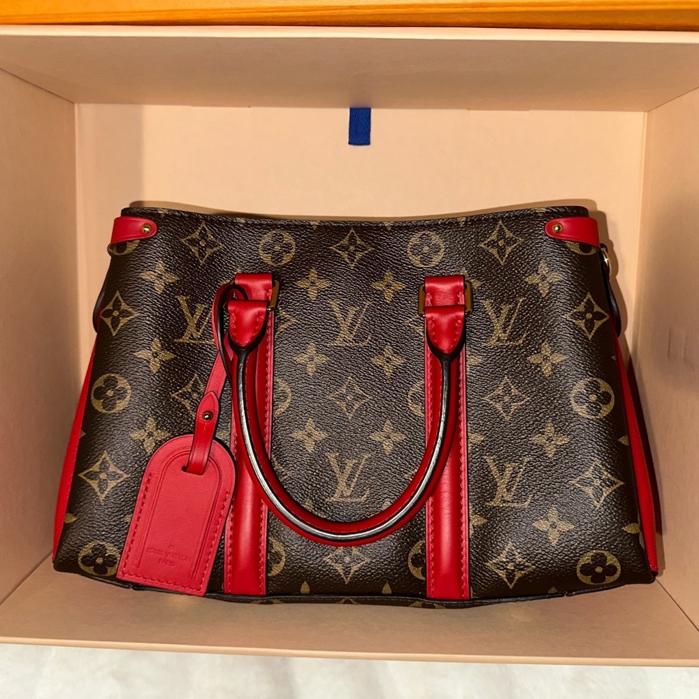 Red and brown Louis Vuitton monogram soufflott mm handbag/crossbody